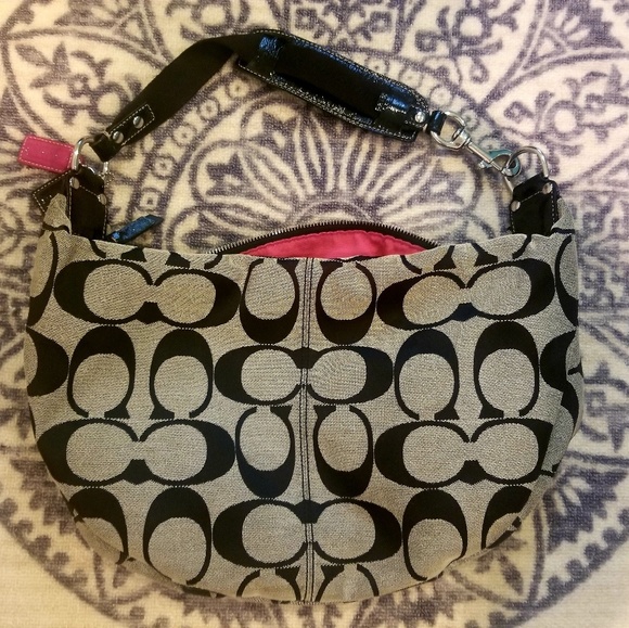 Coach Handbags - Black and white Coach shoulder purse.